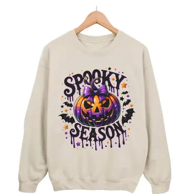 Spooky Season Sweatshirt Featuring A Skeleton Celebrating The Fact That It's Halloween Time